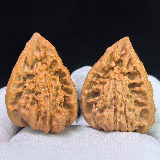 Qilinwen Zuofo (Qilin Pattern Seated Buddha) Scholar Walnuts Pair | 34.0mm x 37.0mm | Stock ID: QLWZF-401E - ThePatinaProject