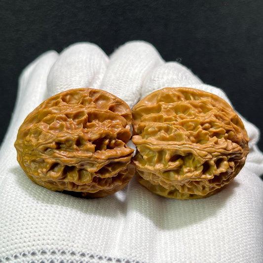 Pair of Walnut Hand Exercisers "Apple Round" PGY-601 by ThePatinaProject, 32mm x 34mm, textured wooden grip for hand strength.