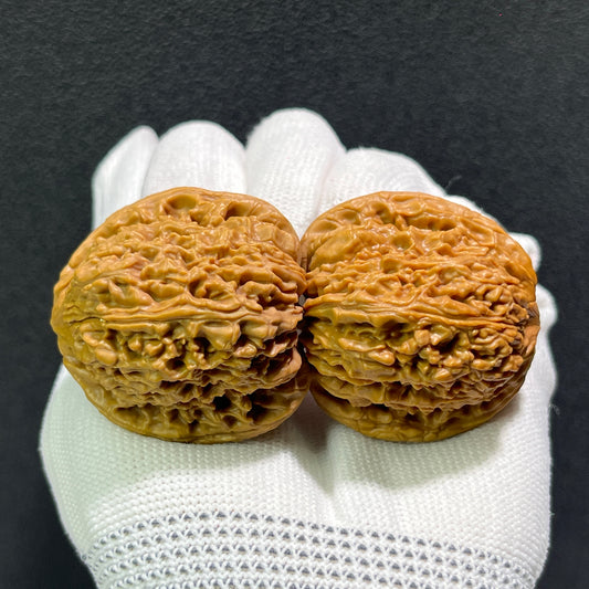 Walnut hand exerciser from ThePatinaProject, The Classic "NJS" Pair, 40.0mm x 41.0mm, with carved walnut surface and ergonomic design.