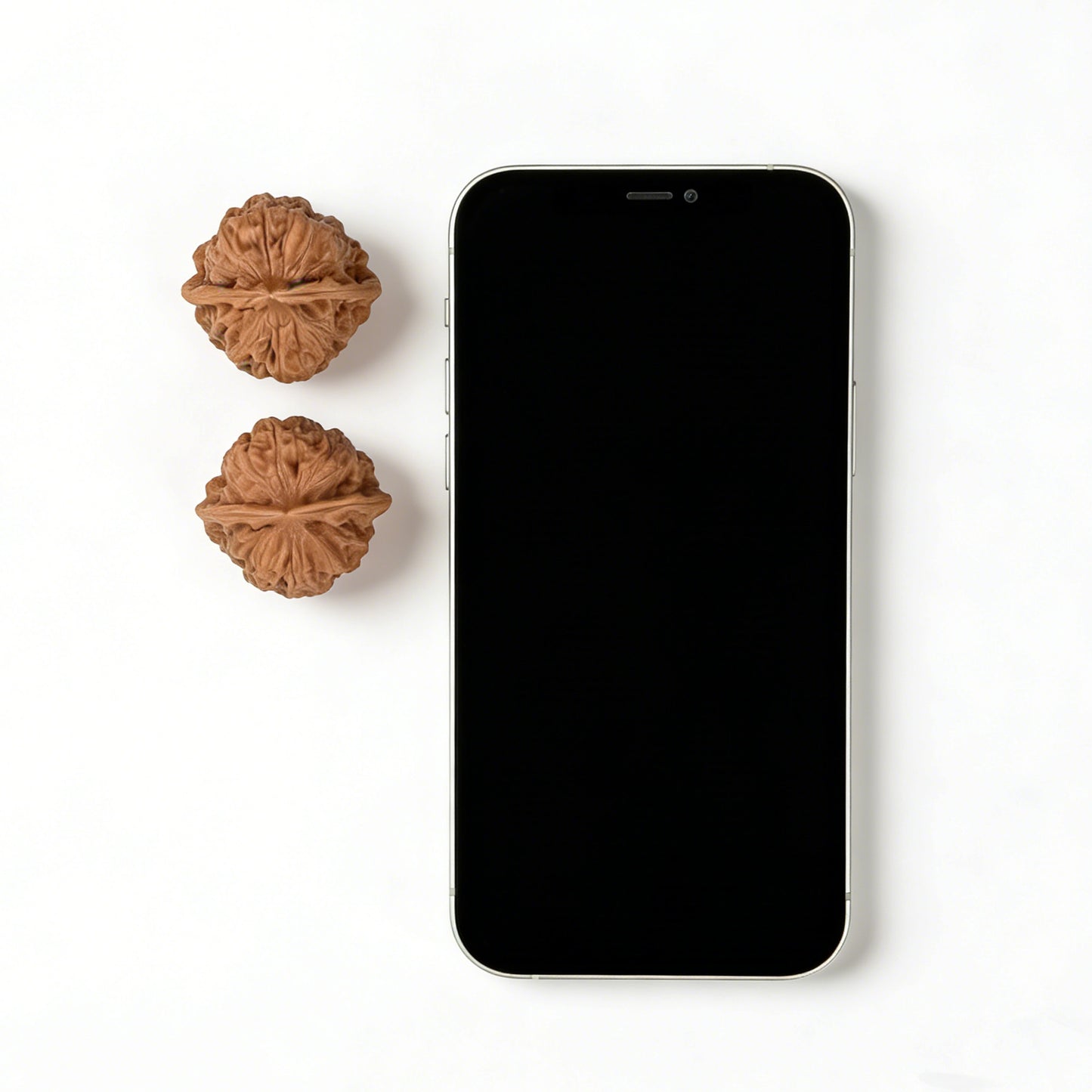 Walnut hand exercisers pair from ThePatinaProject, yuanbao-shaped, measuring 32mm by 31mm, with textured walnut finish.