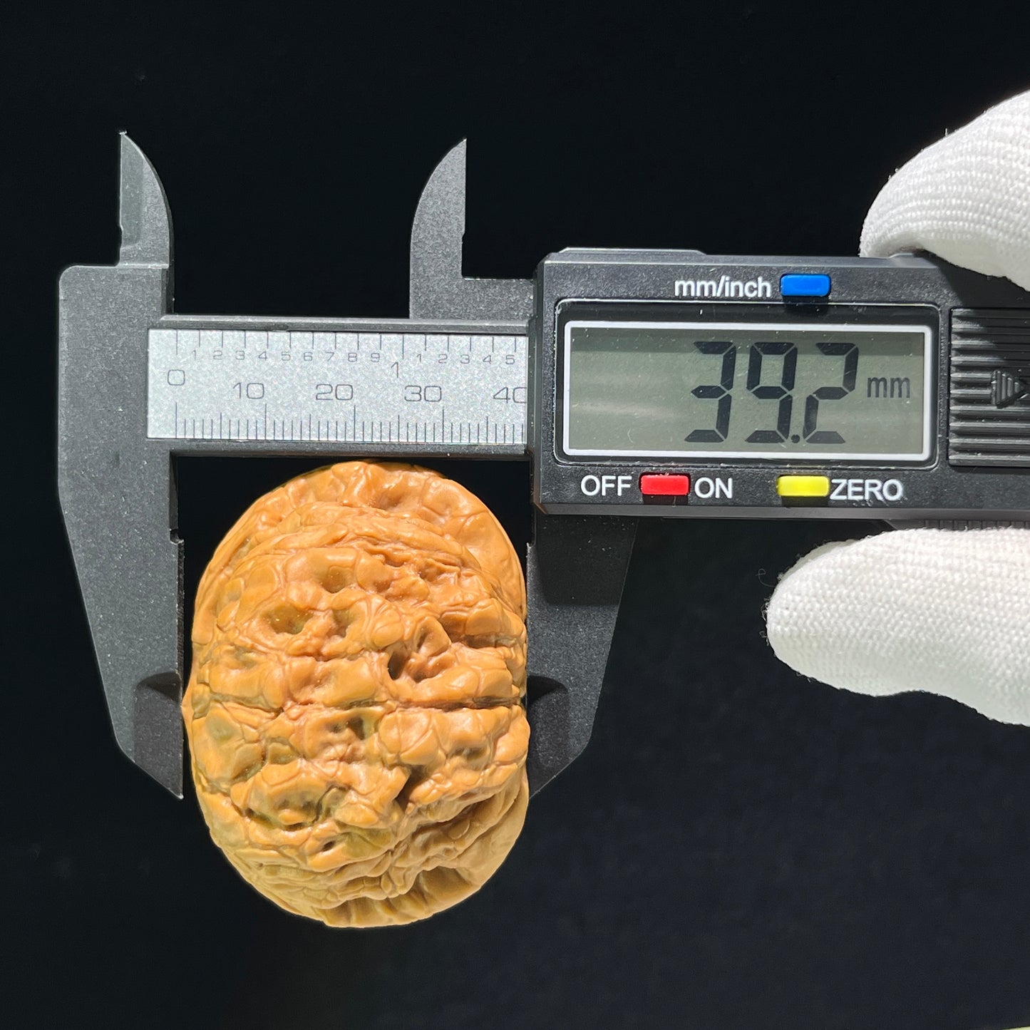 Walnut hand exercisers called Dragon Cauldron pair from ThePatinaProject, boutique grade, 53mm x 52mm, LD-1001C, shown in image.
