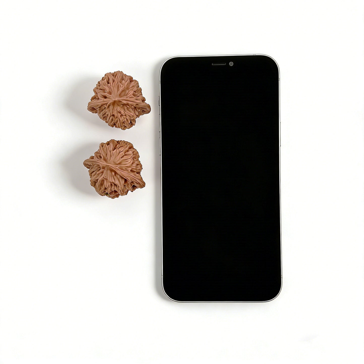 Pair of Walnut Hand Exercisers called Gentleman’s Hat (Gongzi Mao) by ThePatinaProject, measuring 37mm x 32mm with carved details.