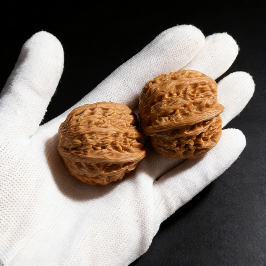 Walnut hand exercisers from ThePatinaProject, Millstone Half-Wall 41mm rare squat pair, shown in natural wood finish.