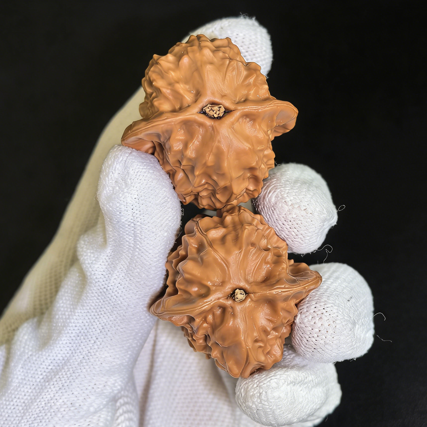 Pair of Walnut Hand Exercisers featuring porcelain doll design with micro-grain texture, 35mm size by ThePatinaProject.