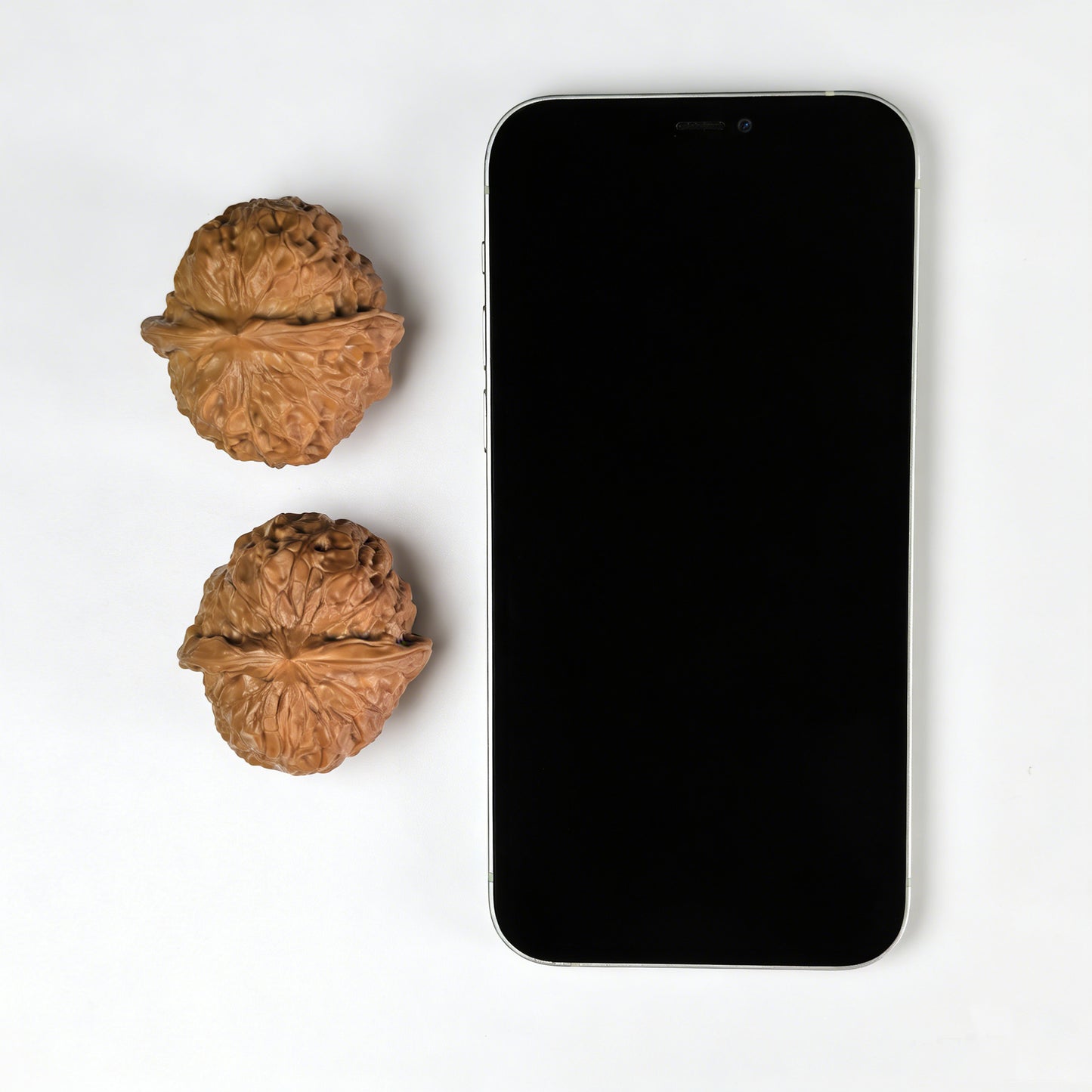 Walnut hand exerciser pair called Pumpkin Block (Nan Gua Dun), 42mm x 44mm, with carved pumpkin design, by ThePatinaProject.