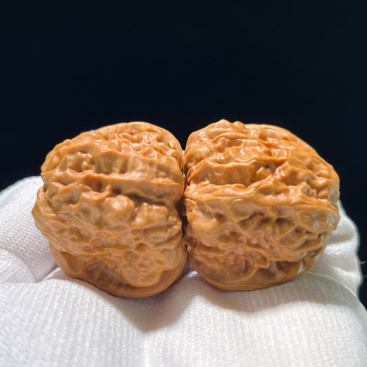 Walnut hand exerciser named "Toad Head" full-belly pair by ThePatinaProject, 38mm x 41mm, featuring detailed carved design.