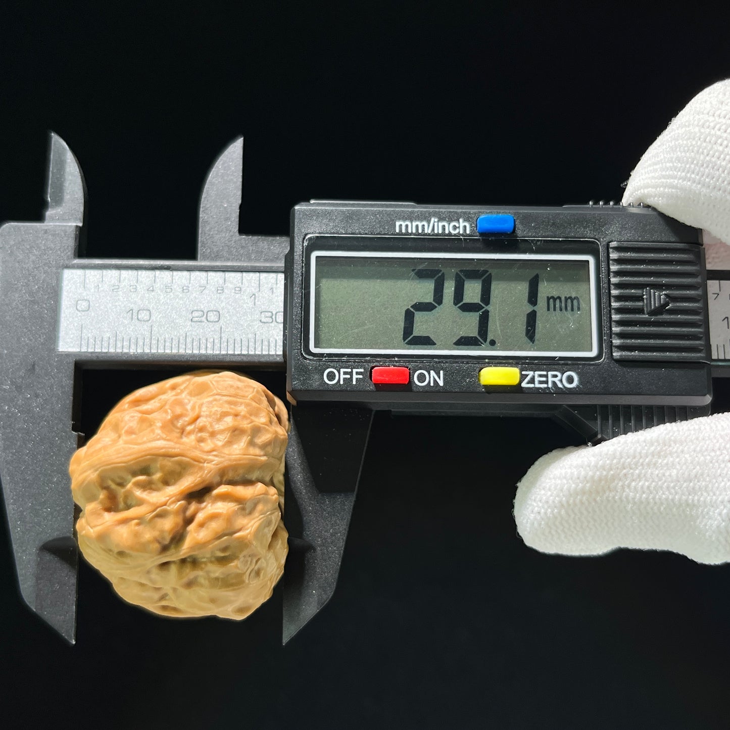 Pair of Walnut Hand Exercisers called Toad Head (Ha Ma Tou) by ThePatinaProject, 36mm x 38mm, showing textured walnut wood surfaces.