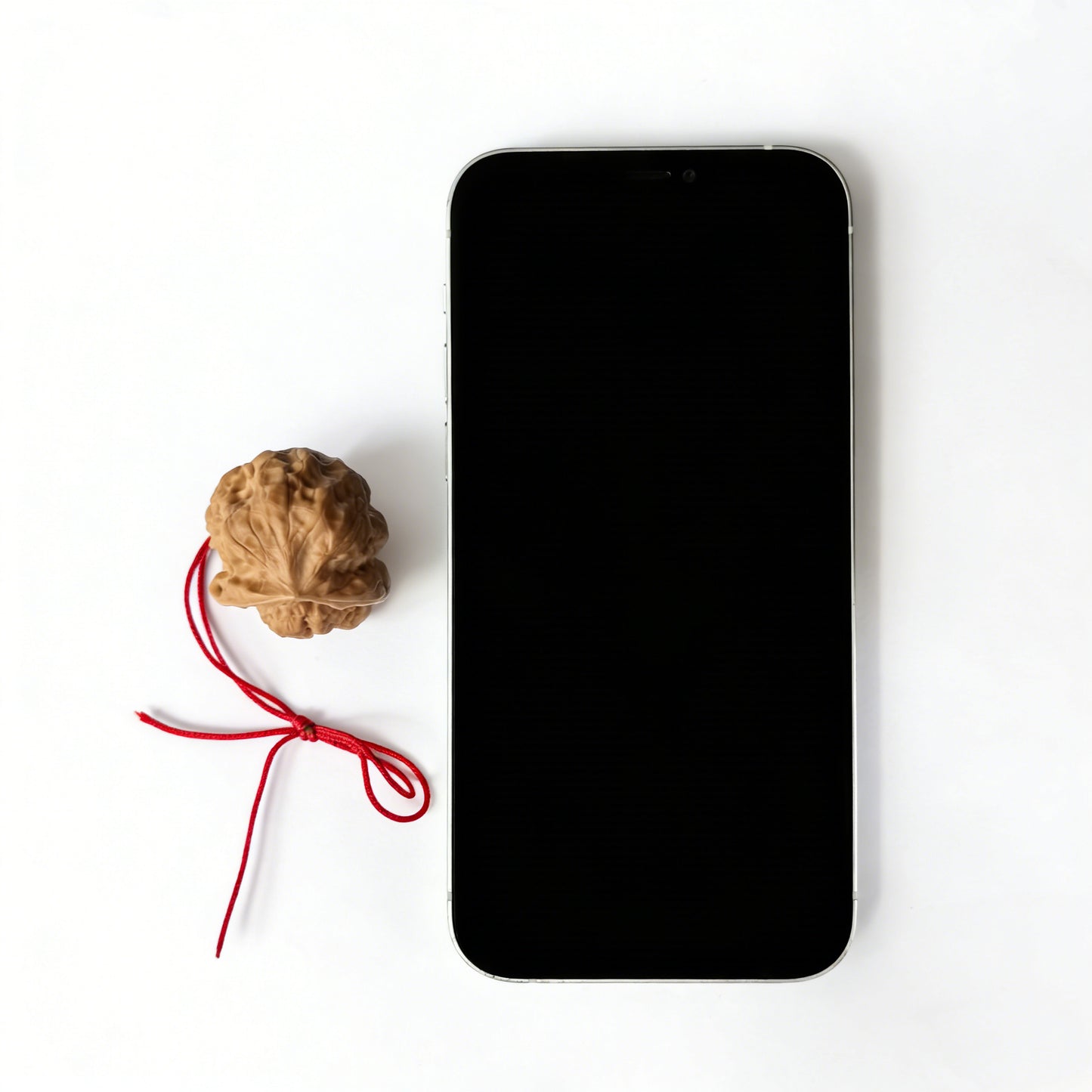 Walnut hand exerciser pendant featuring a natural sculptural toad head design, handcrafted by ThePatinaProject, 32mm accessory.