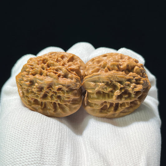 Pair of Xia Yun Ling Peach Heart walnut hand exercisers from ThePatinaProject, featuring 39mm and 36mm sizes.