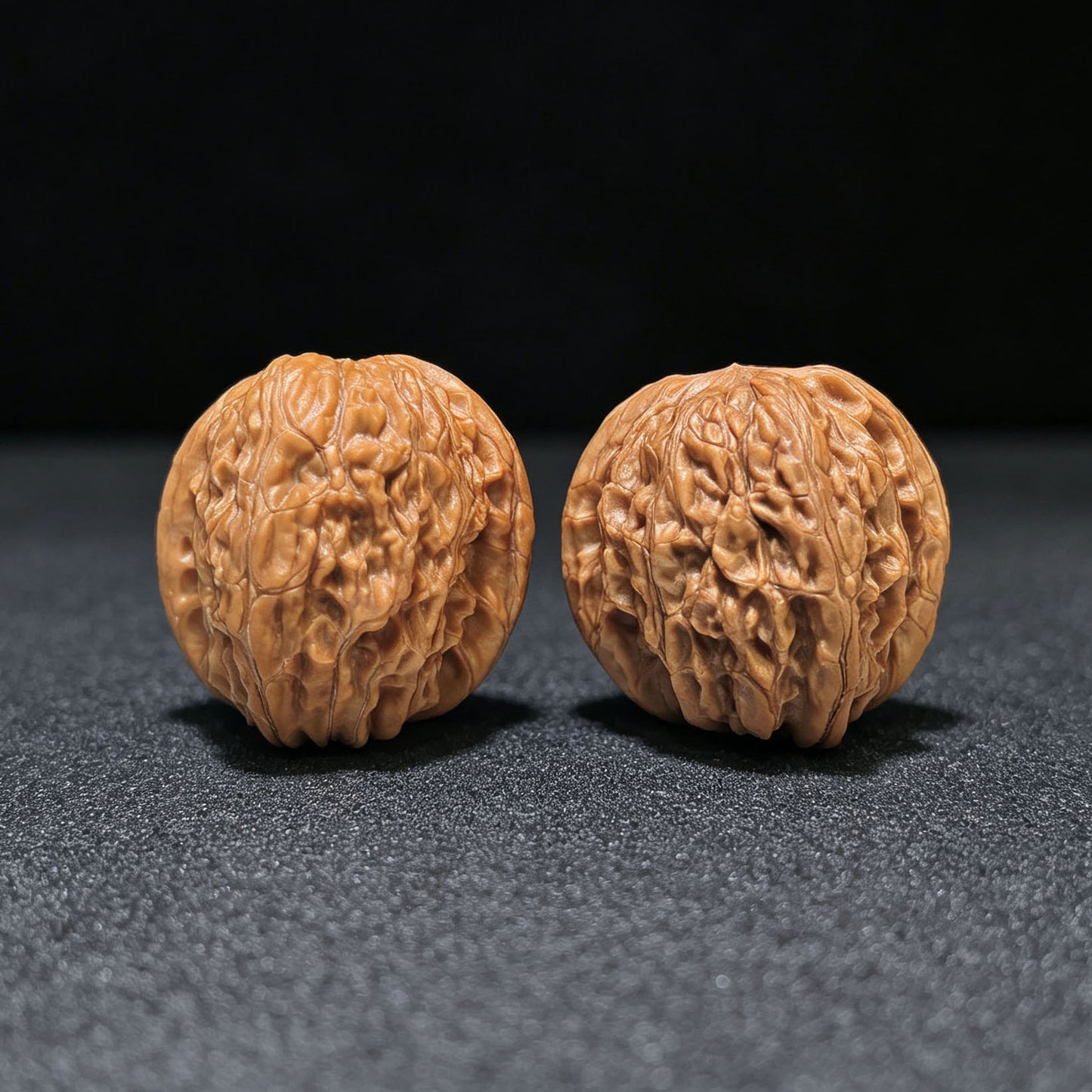 "Wild Pebble Millstone" Ye Sheng Shizi Mopan Wenwan Walnuts (Pair) | 34.0mm x 35.0mm | Stock ID: SZMP-1401