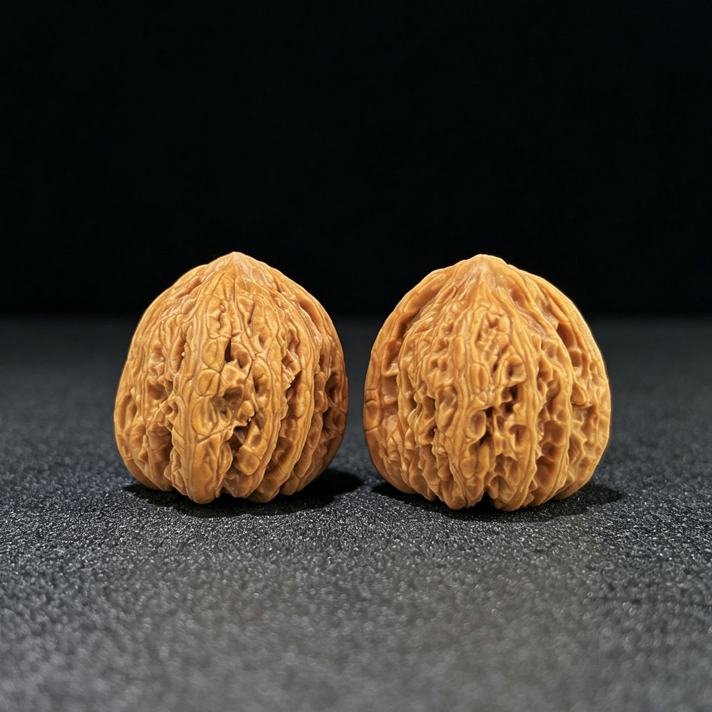 The "Micro-Textured Ruby" (Mi Wen Hong Bao Shi) Miniature Finger-Twirling Pair | 32.0mm x 31.0mm | MWHBS-1001