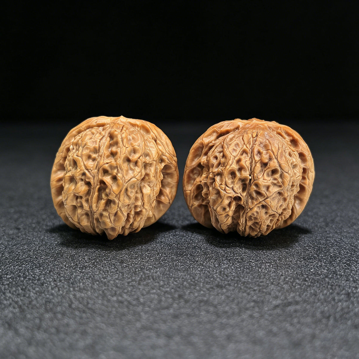 "Blood Kylin" Xueqilin Wenwan Walnuts (Pair) | 38.0mm x 39.0mm | Stock ID: XQL-1401 - ThePatinaProject