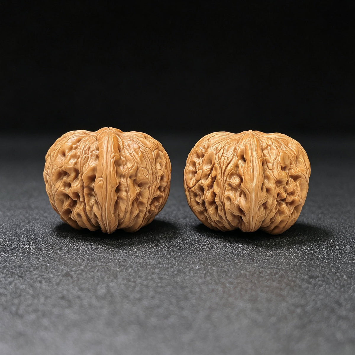 Broad-Rimmed Rounded Pinggu Yuanbao Wenwan Walnut Pair — 38.0mm x 39.0mm | PGYB-1504C - ThePatinaProject