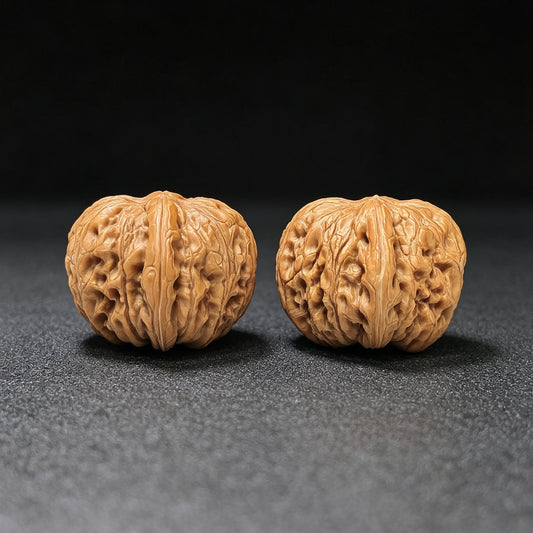 Broad-Rimmed Rounded Pinggu Yuanbao Wenwan Walnut Pair — 38.0mm x 39.0mm | PGYB-1504C - ThePatinaProject