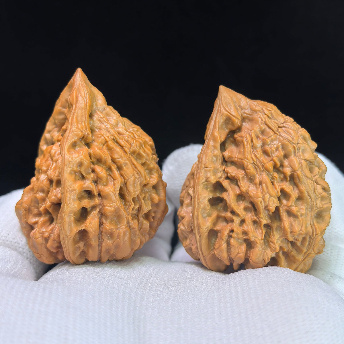 Qilinwen Zuofo (Qilin Pattern Seated Buddha) Scholar Walnuts Pair | 34.0mm x 37.0mm | Stock ID: QLWZF-401E - ThePatinaProject