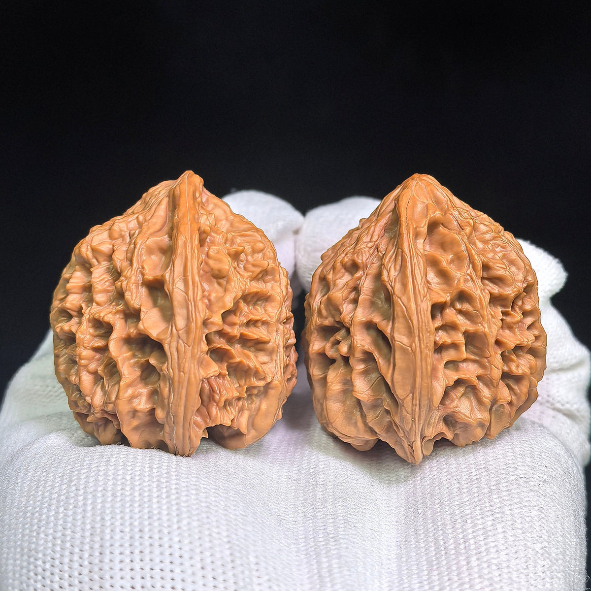 Red-Shell Wild Ox “Tian Can Jiao” Wenwan Walnuts Pair | Sculptural Natural Form | 41.0mm × 39.0mm | YN-C1E3E - ThePatinaProject