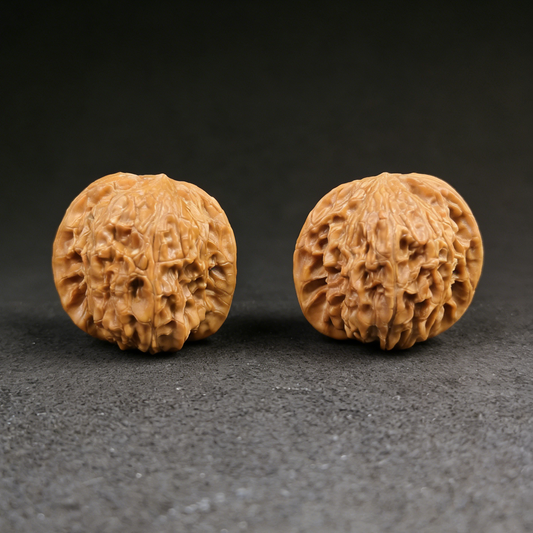 Walnut hand exerciser featuring the Wild Millstone 3-Day Red finish, 38mm rapid patina pair by The Patina Project for grip strength training