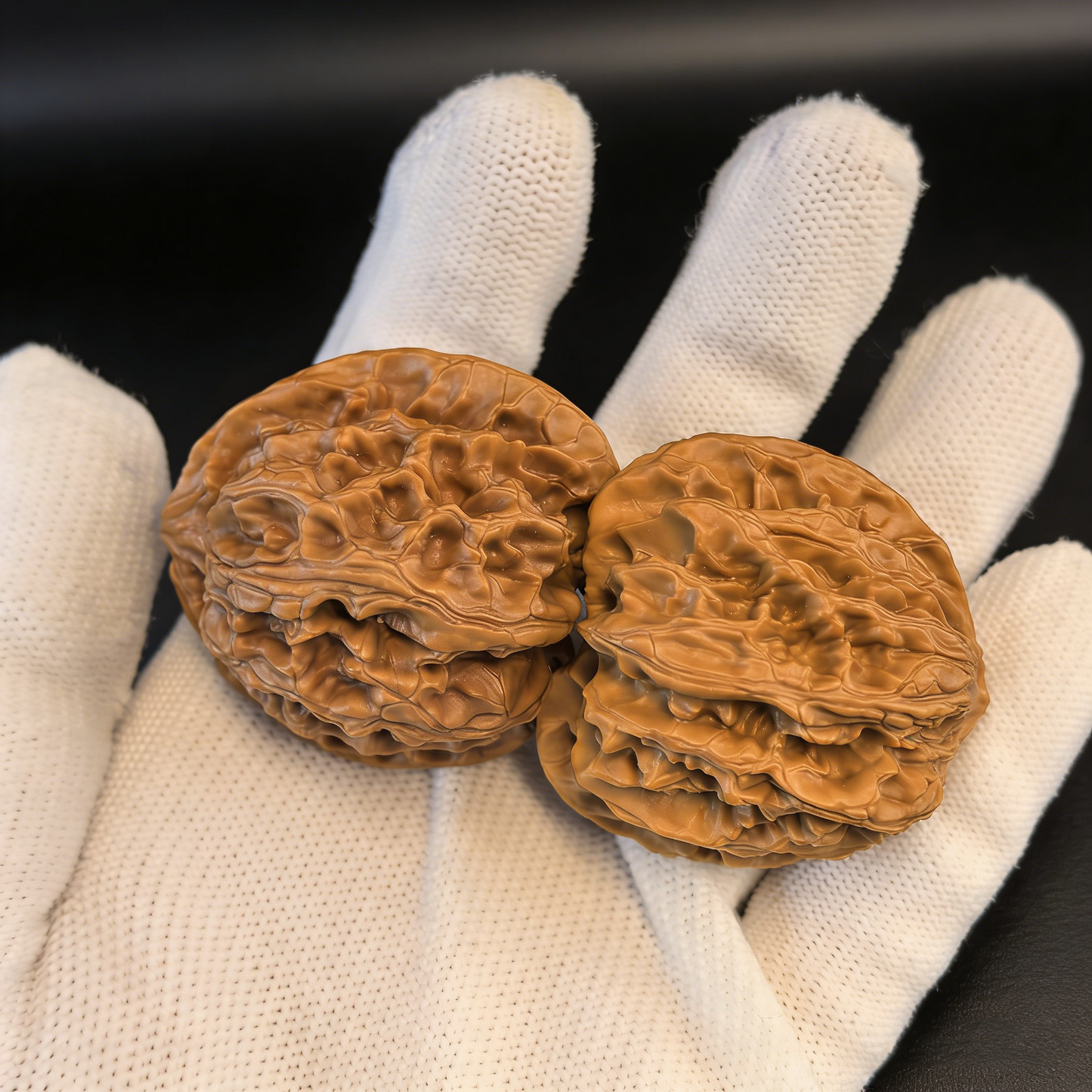Walnut hand exerciser featuring lion head design from The Patina Project's Apple Garden collection, 38mm classic round pair.