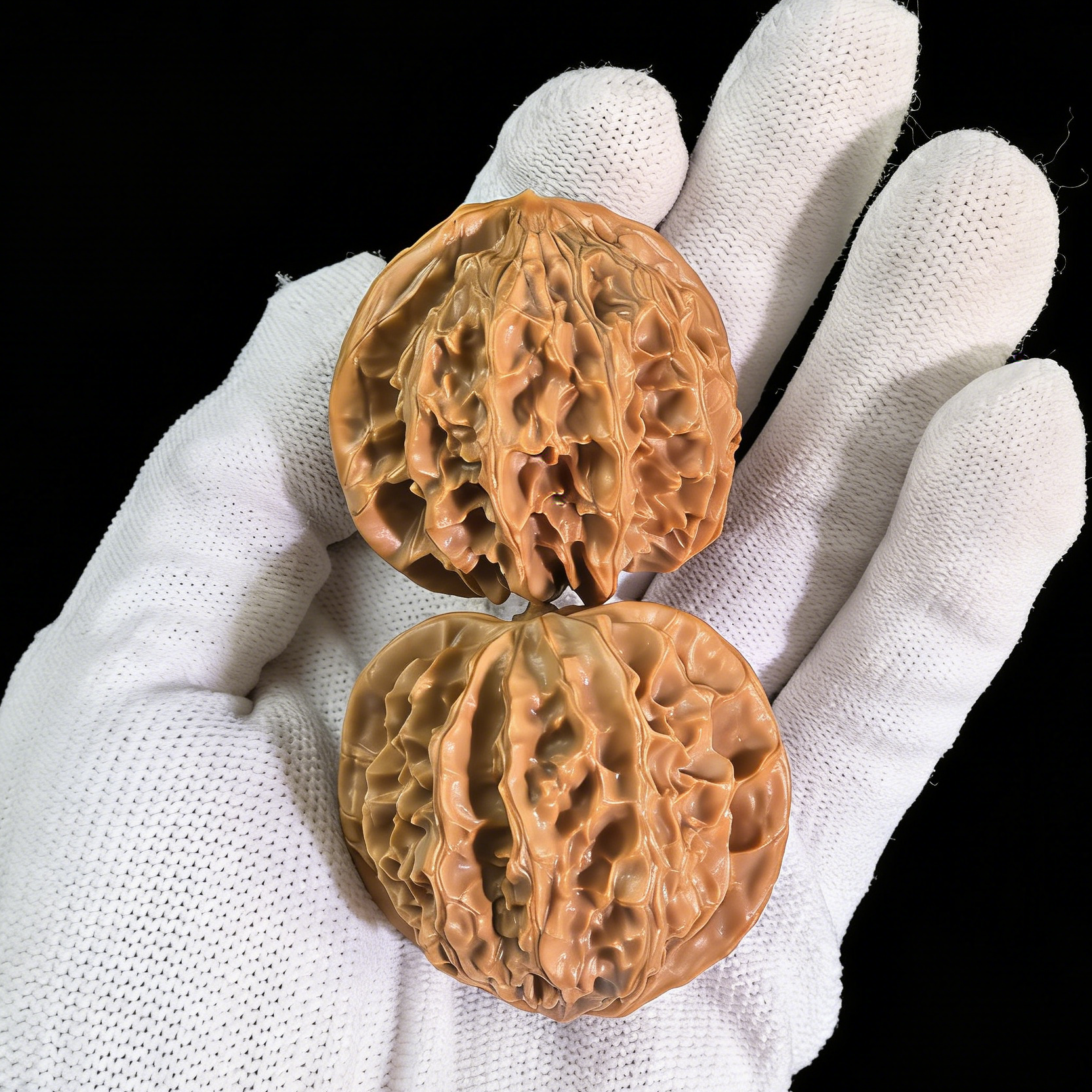 Pair of Walnut Hand Exercisers called Lantern by The Patina Project, featuring deep volcanic ridges and classic sphere design, 43mm size.