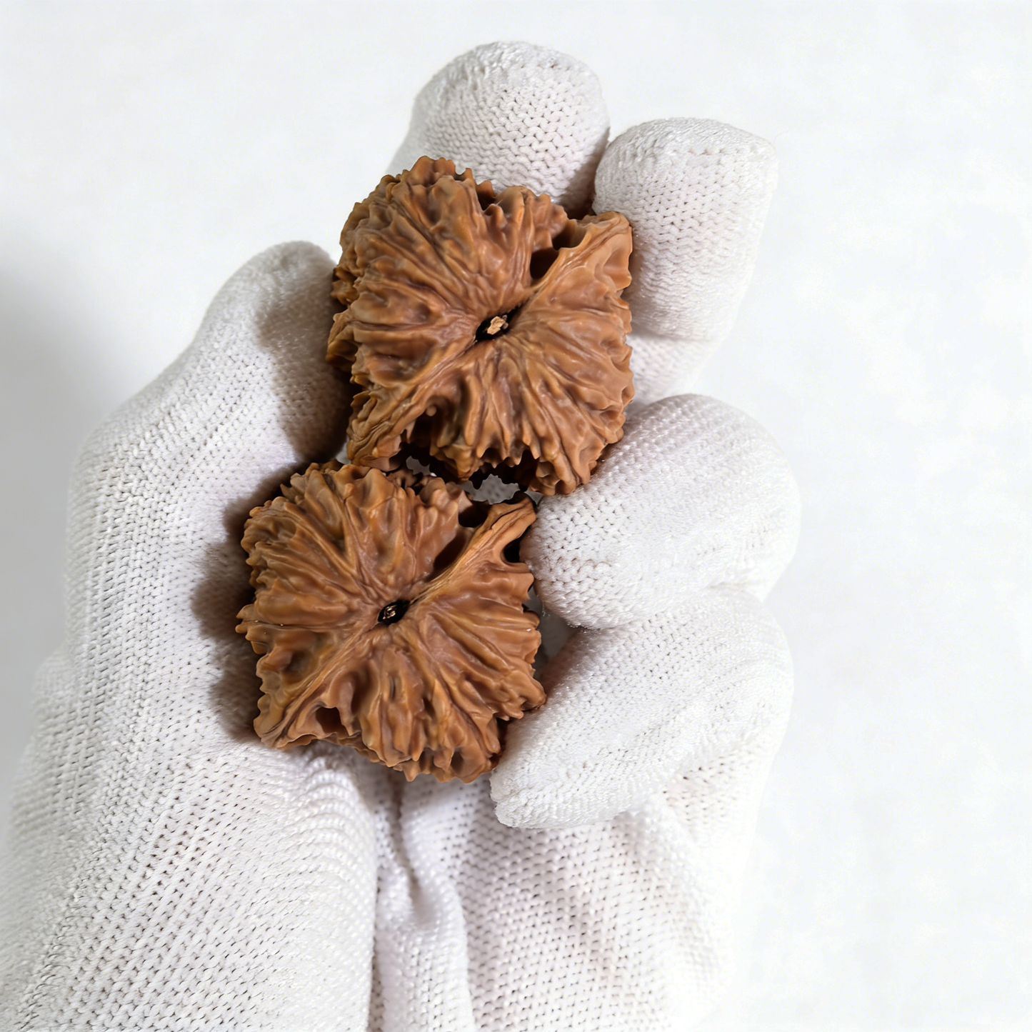 Walnut hand exercisers with celestial "Stardust" texture from The Patina Project, featuring the "Meteor Shower" Liu Xing Yu design, 35mm pair.