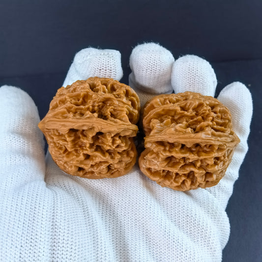 Pair of Walnut Hand Exercisers with deep ridges, Nine Dragon Muscle (Jiu Long Jin) 39mm diameter for strength training.