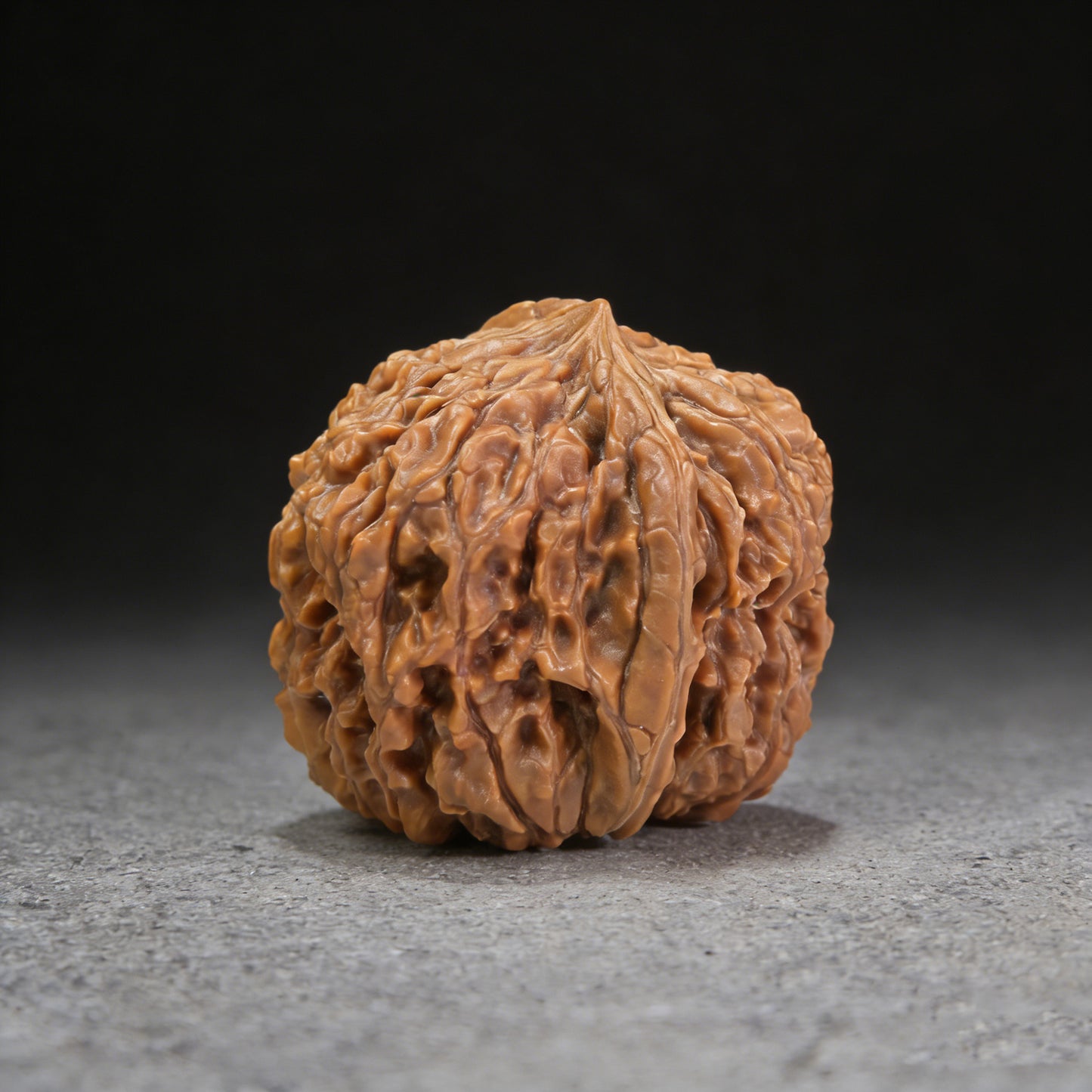 ThePatinaProject 137 single walnut hand exerciser, 37mm diameter, shows a smooth wooden walnut-shaped grip for hand strength training.