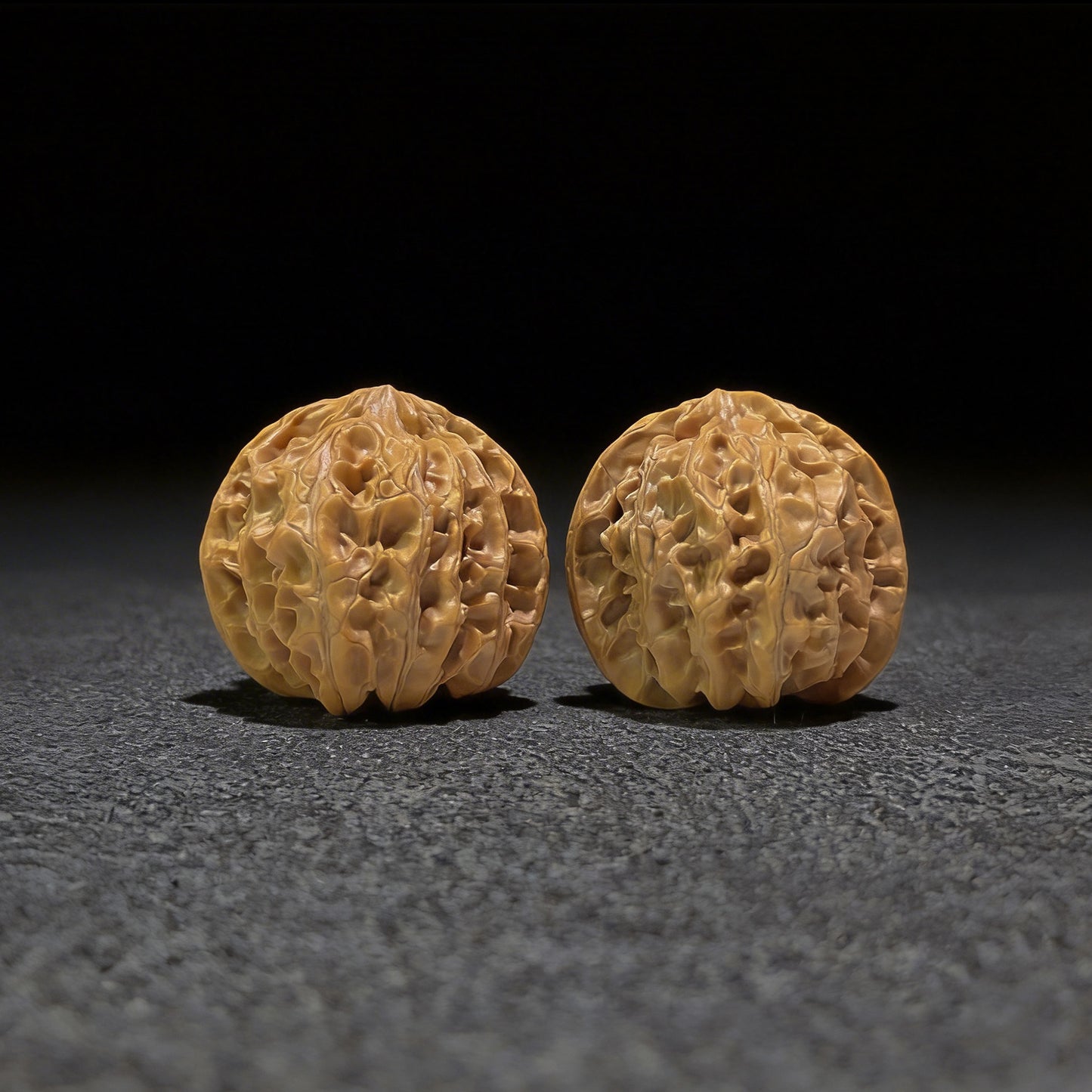 Walnut hand exerciser called "Apple Round" by ThePatinaProject, 38mm x 37mm, with smooth walnut finish and ergonomic design.