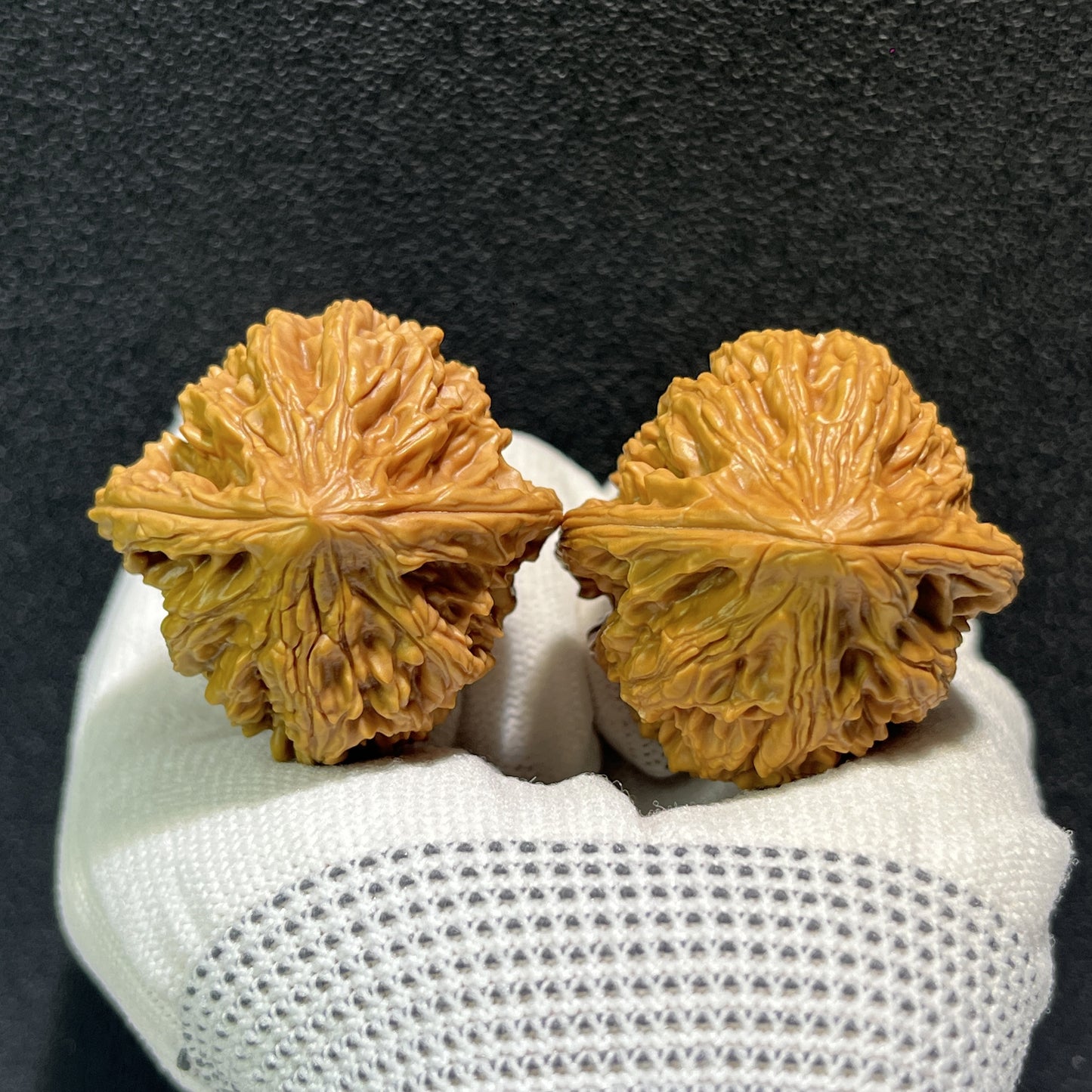 Walnut hand exercisers from ThePatinaProject, Beijing Chicken Heart pair, 39mm x 39mm, with intricate wood grain details