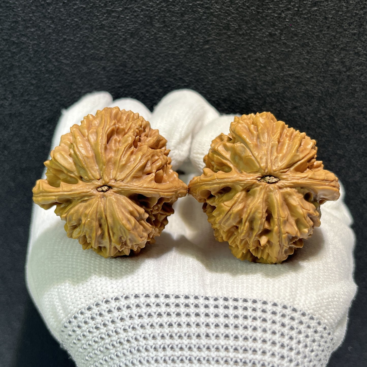 Beijing Chicken Heart Walnut Hand Exerciser by ThePatinaProject, 39mm x 39mm, with textured surface for grip and hand strength training.