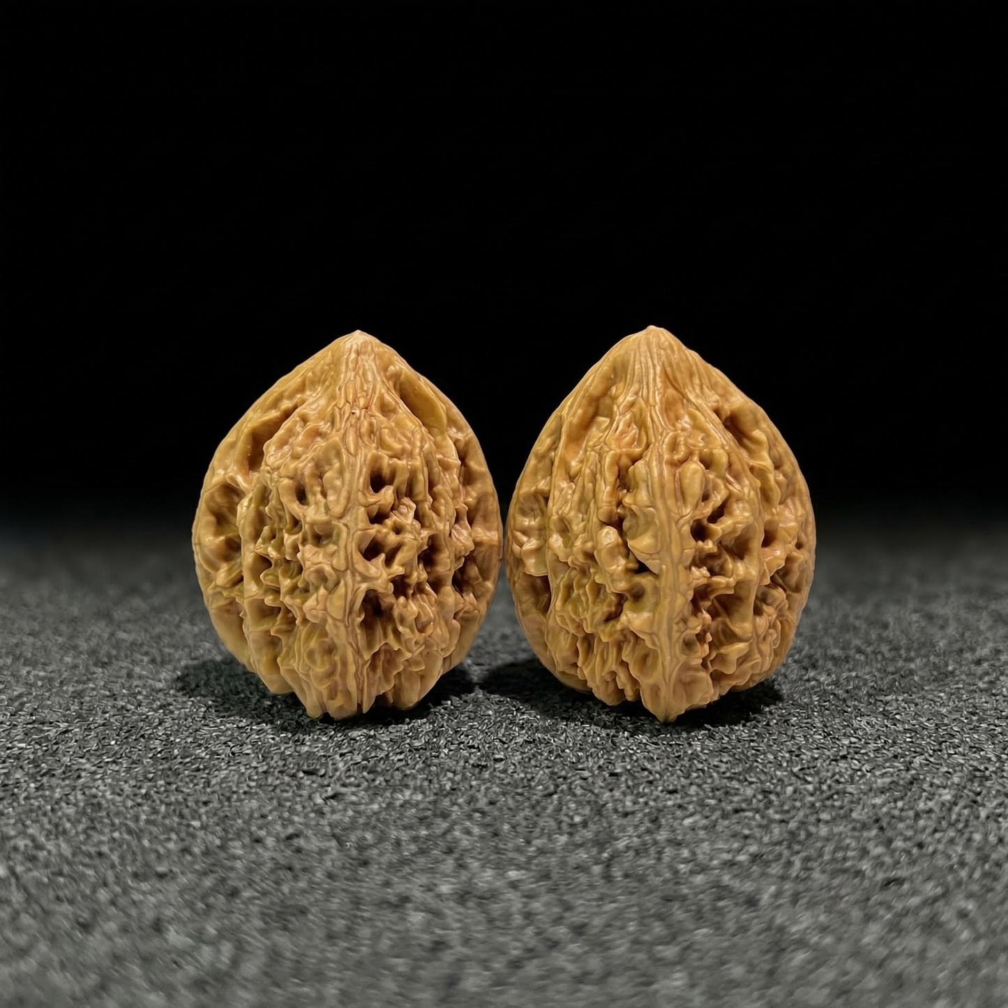 Pair of Beijing Chicken Heart Walnut Hand Exercisers by ThePatinaProject, 40mm x 40mm, designed for hand strength training.