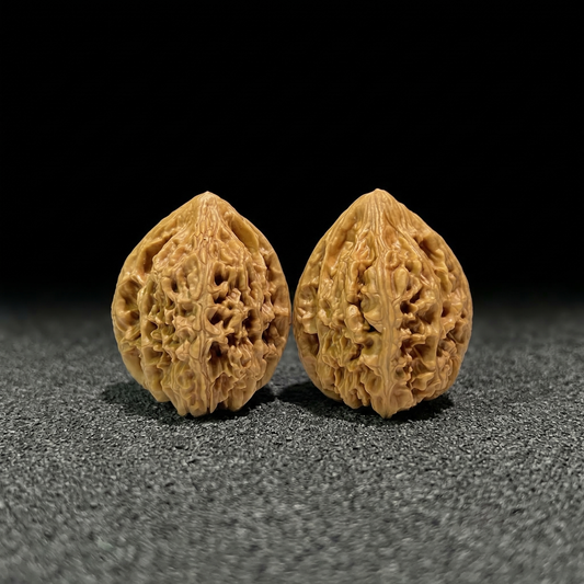Pair of Beijing Chicken Heart Walnut Hand Exercisers by ThePatinaProject, 40mm x 40mm, designed for hand strength training.
