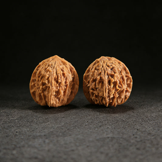 Pair of Beijing Chicken Heart Walnut Hand Exercisers by ThePatinaProject, 37mm, featuring detailed carved chicken heart design.