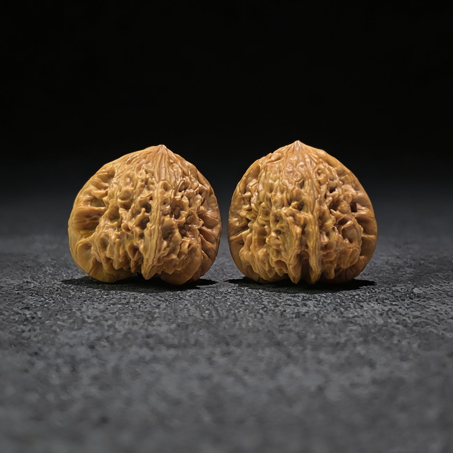 Walnut hand exerciser pair called Blizzard by ThePatinaProject, 44mm x 42mm size, textured walnut wood grip for strength training.