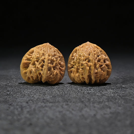Walnut hand exerciser pair called Blizzard by ThePatinaProject, 44mm x 42mm size, textured walnut wood grip for strength training.