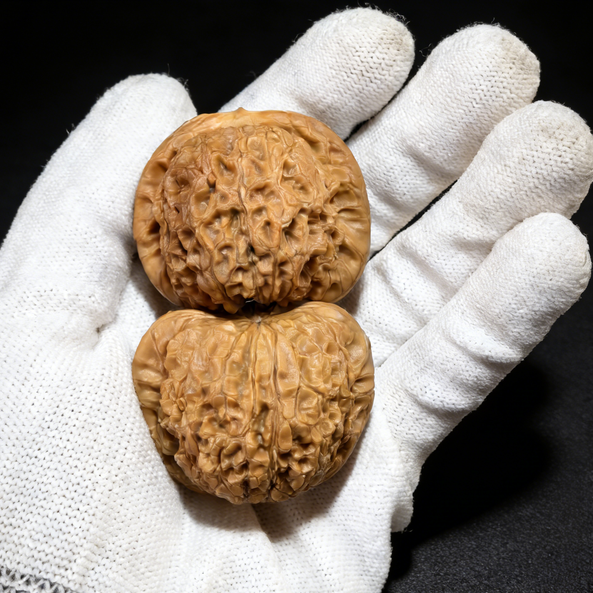 Pair of Walnut Hand Exercisers featuring the Blood Kirin design with thick edges and shredded texture, 43mm collector’s set by ThePatinaProject.