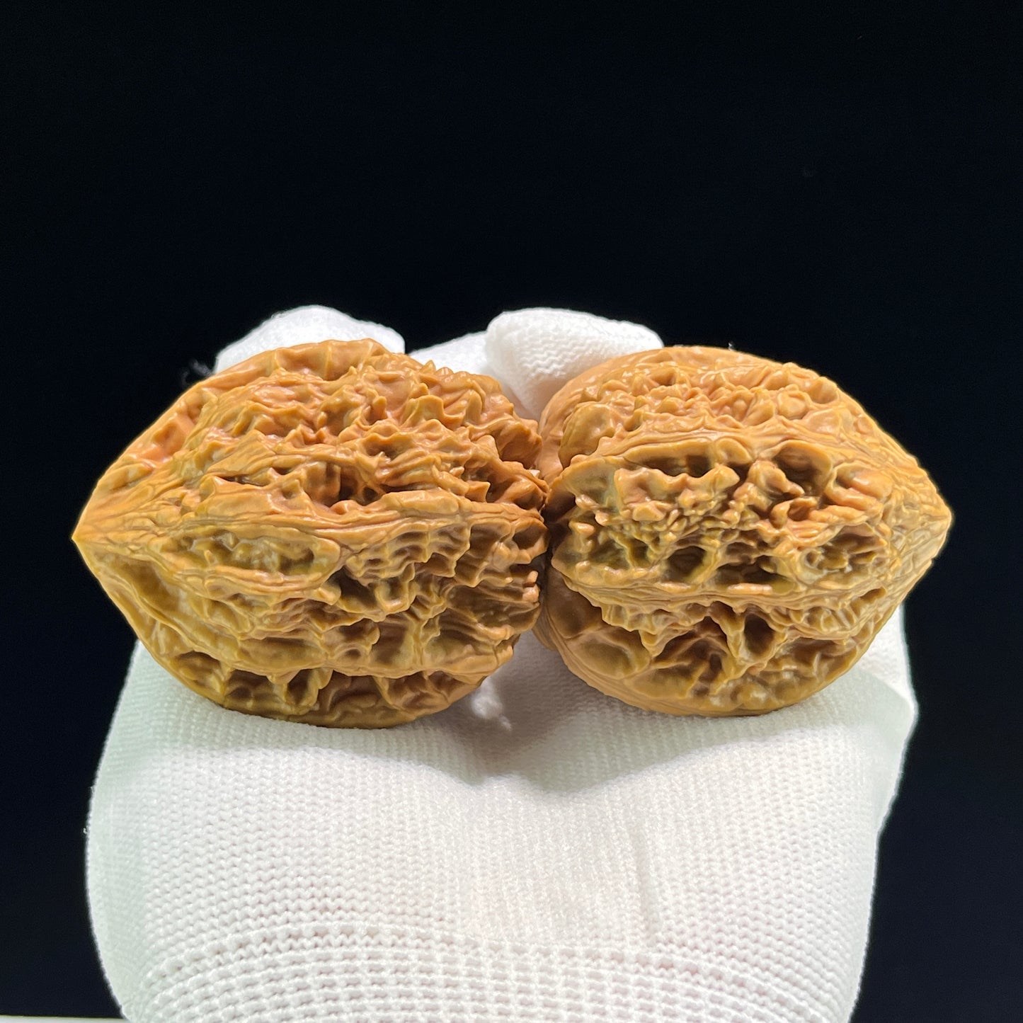 Walnut hand exerciser from ThePatinaProject, The Classic Beijing Chicken Heart (Ji Xin), balanced pair, 41mm size, BJJX-601.