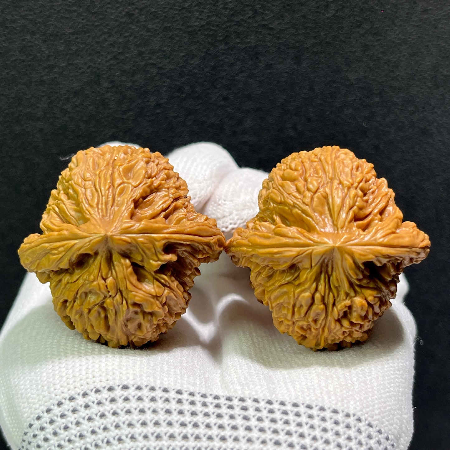 Walnut hand exerciser from ThePatinaProject, NJS-606, with 40.0mm x 41.0mm dimensions, showcasing smooth wooden surface and ergonomic design.