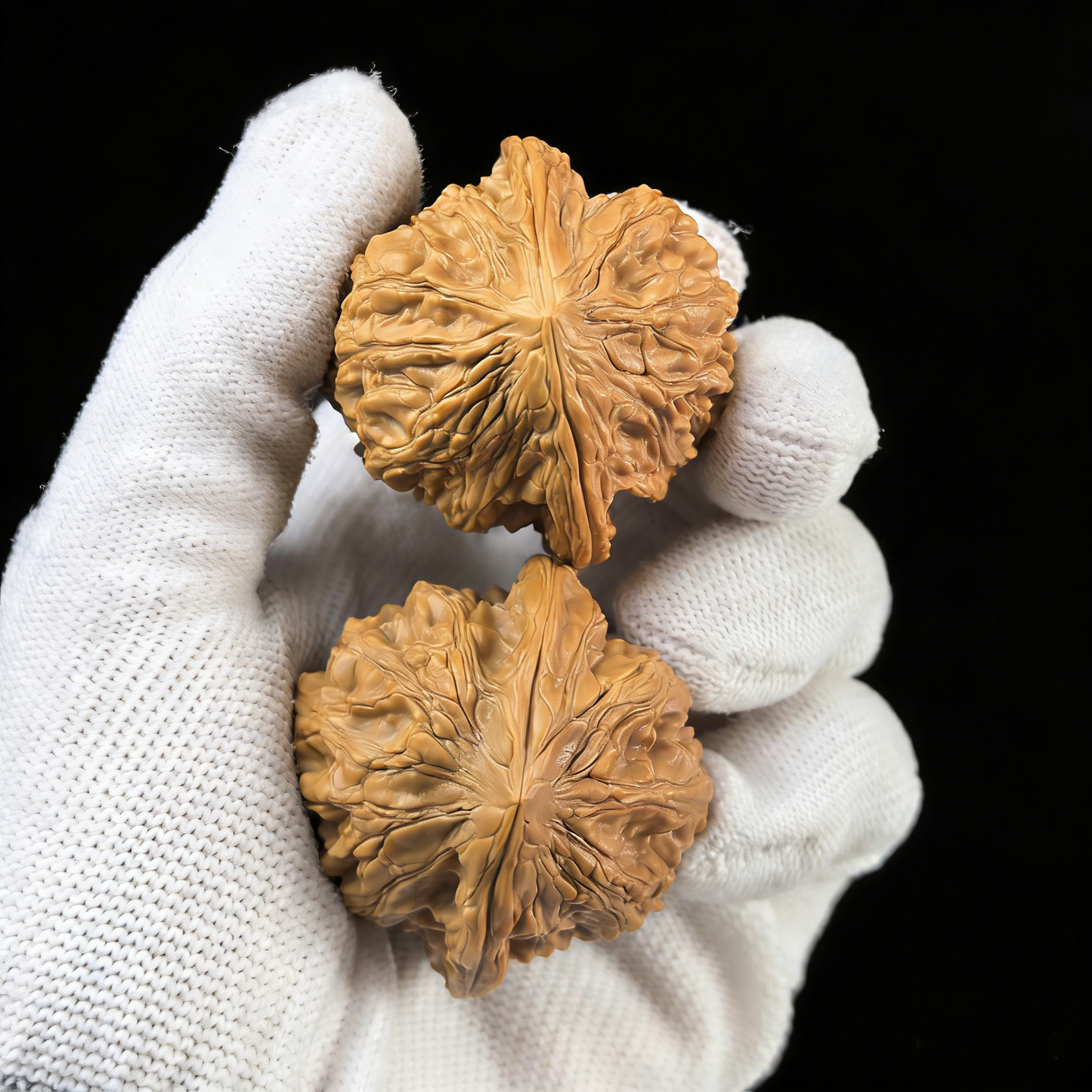 Pair of Da Gu Shi large stone walnut hand exercisers by ThePatinaProject, 41.1mm diameter, textured stone surface for grip and strength training.
