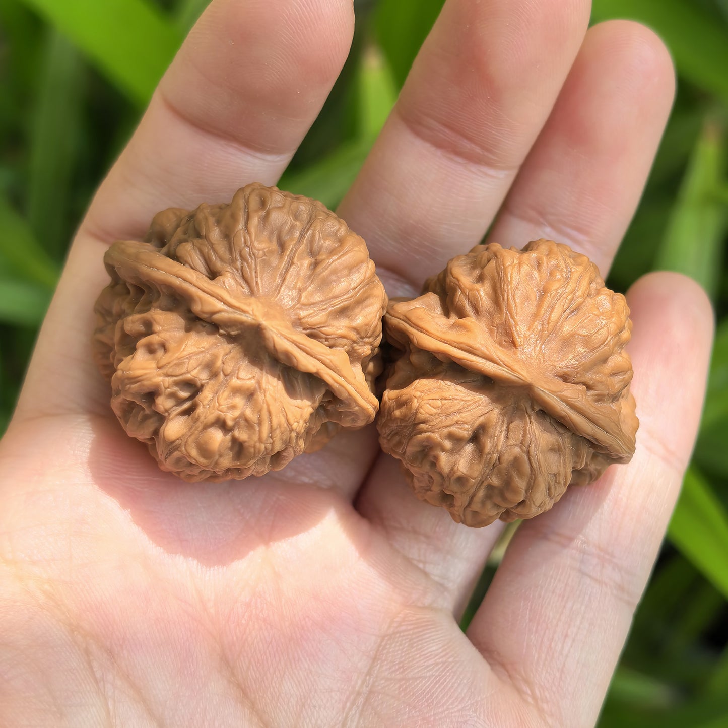 Walnut hand exercisers pair from ThePatinaProject, De Tou Gou (Yuanbao) shape, 32mm x 31mm, textured wood grips for hand strengthening