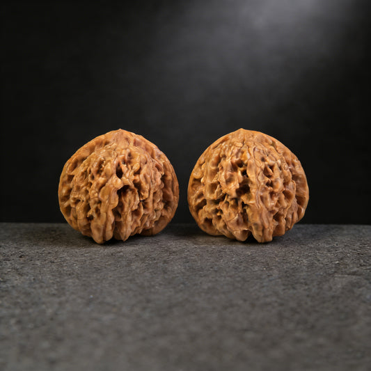 Pair of Chengtuo Dwarf Weight walnut hand exercisers, 39mm x 37mm, from ThePatinaProject, showing the textured wooden surface.