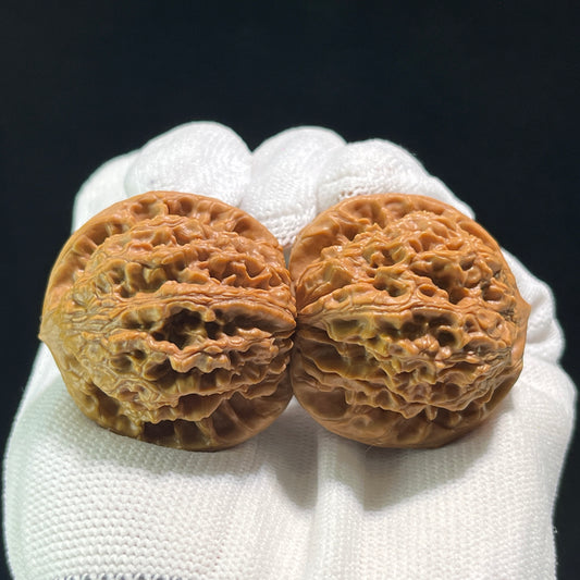 Pair of Walnut Hand Exercisers called Earth Cauldron (Kun Ding), 39mm x 38mm, from ThePatinaProject, shown in KD-601 image.