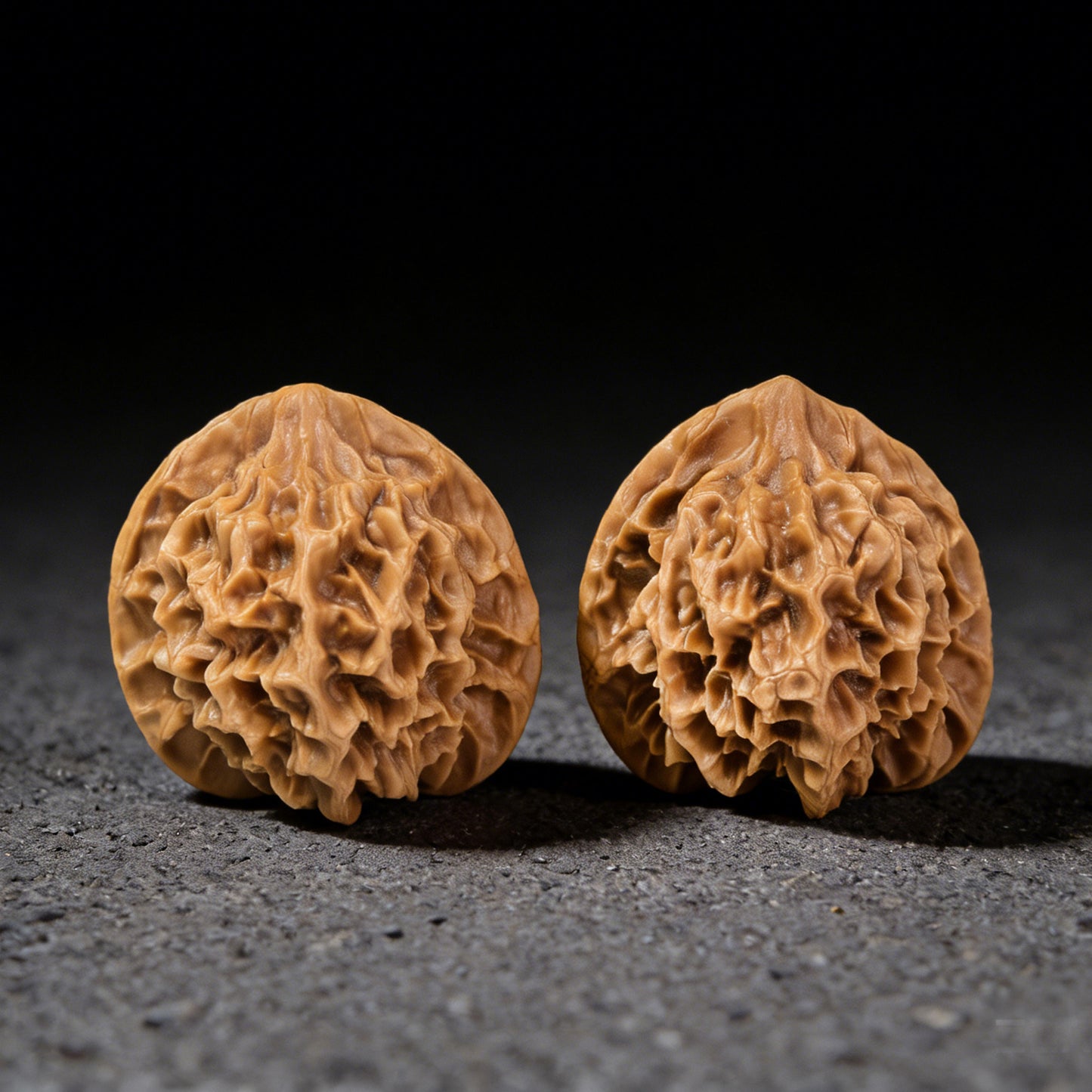 Walnut hand exercisers pair "Emperor" (Di Wang) by ThePatinaProject, 49mm x 45mm, featuring detailed carved designs.