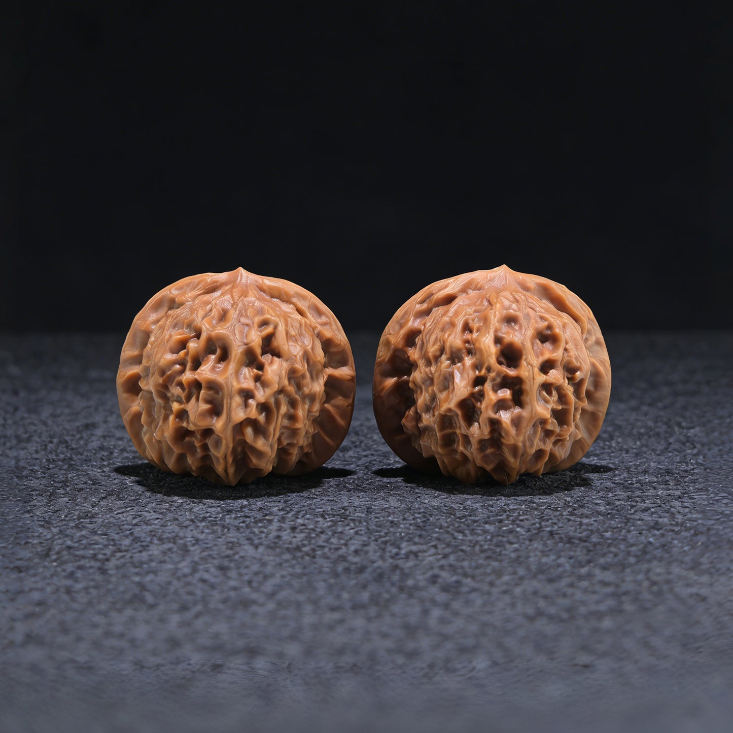 Walnut hand exerciser from ThePatinaProject, featuring a porcelain doll design, boutique grade, 38mm x 35mm size, CWW-704 model.