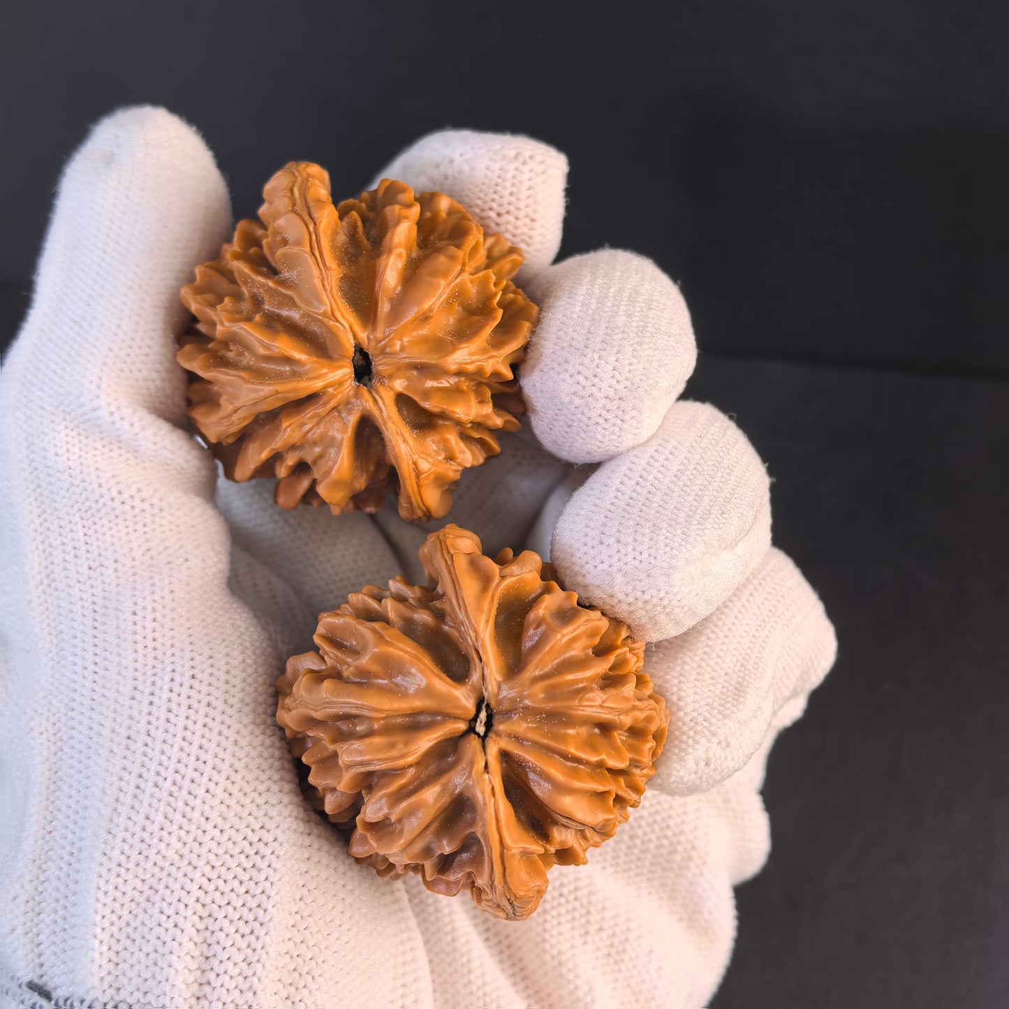 Pair of walnut hand exercisers shaped like mice, featuring intricate details, designed for strength and prosperity, by ThePatinaProject.