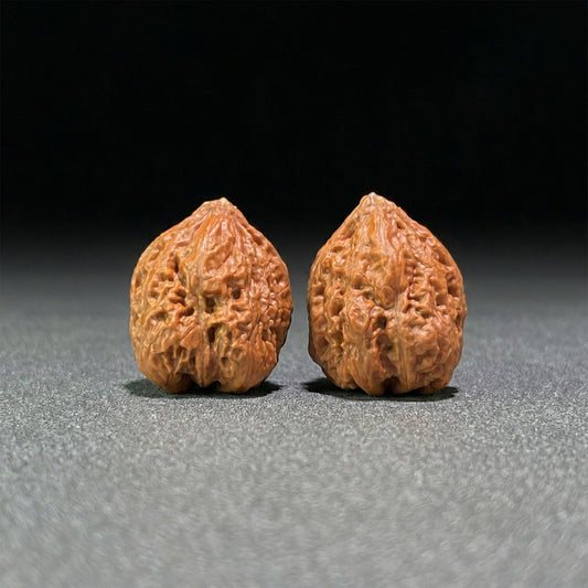 Four-faced frog walnut hand exerciser by ThePatinaProject, 26mm mini pair with intricate carved details and smooth finish.