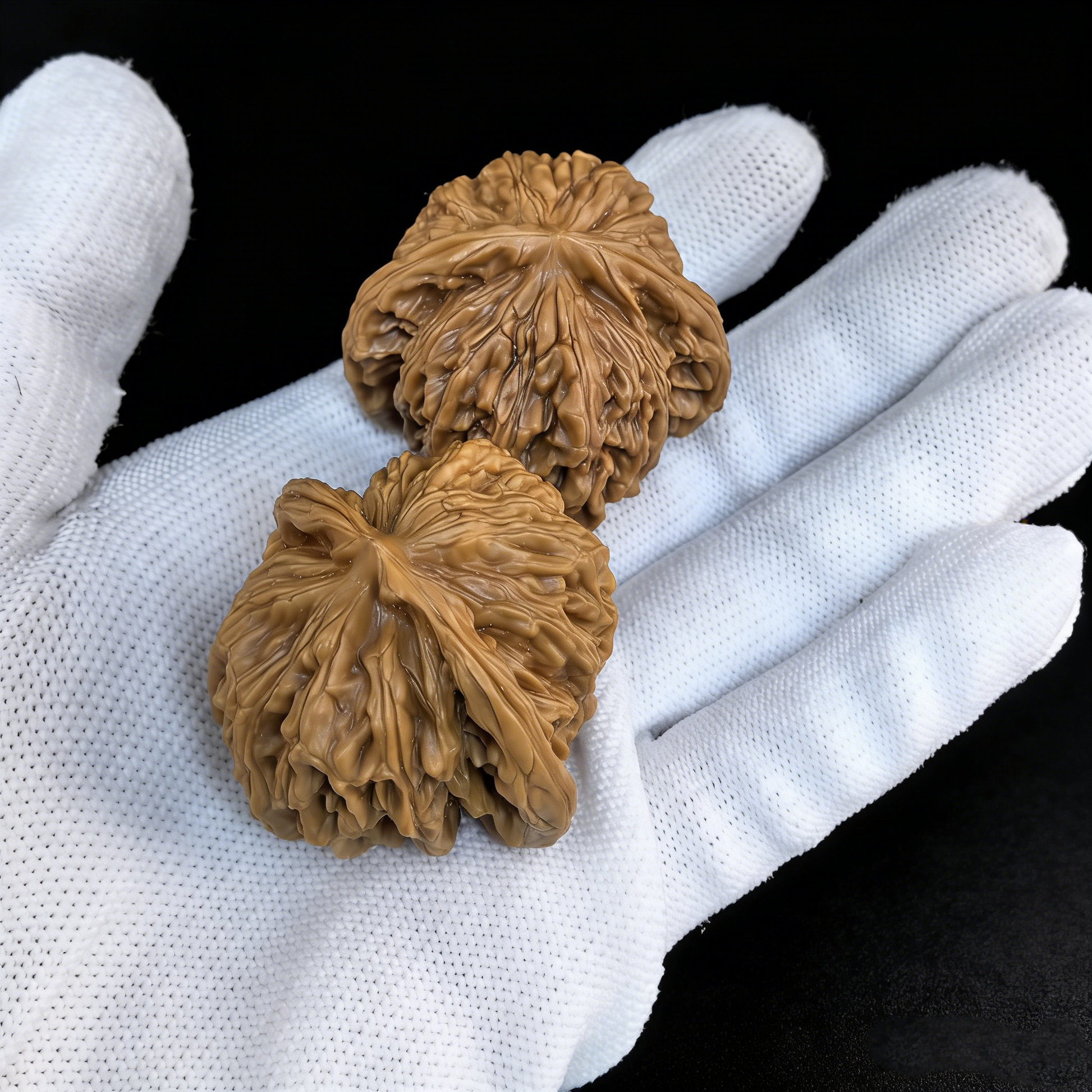 Walnut hand exerciser featuring Lion Head "Four Towers" design on a 39mm chrysanthemum base by ThePatinaProject.