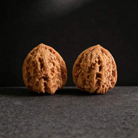 Pair of Walnut Hand Exercisers featuring Gecko Luohan Head design, 35mm, from ThePatinaProject Bihu Luohan Tou collection.