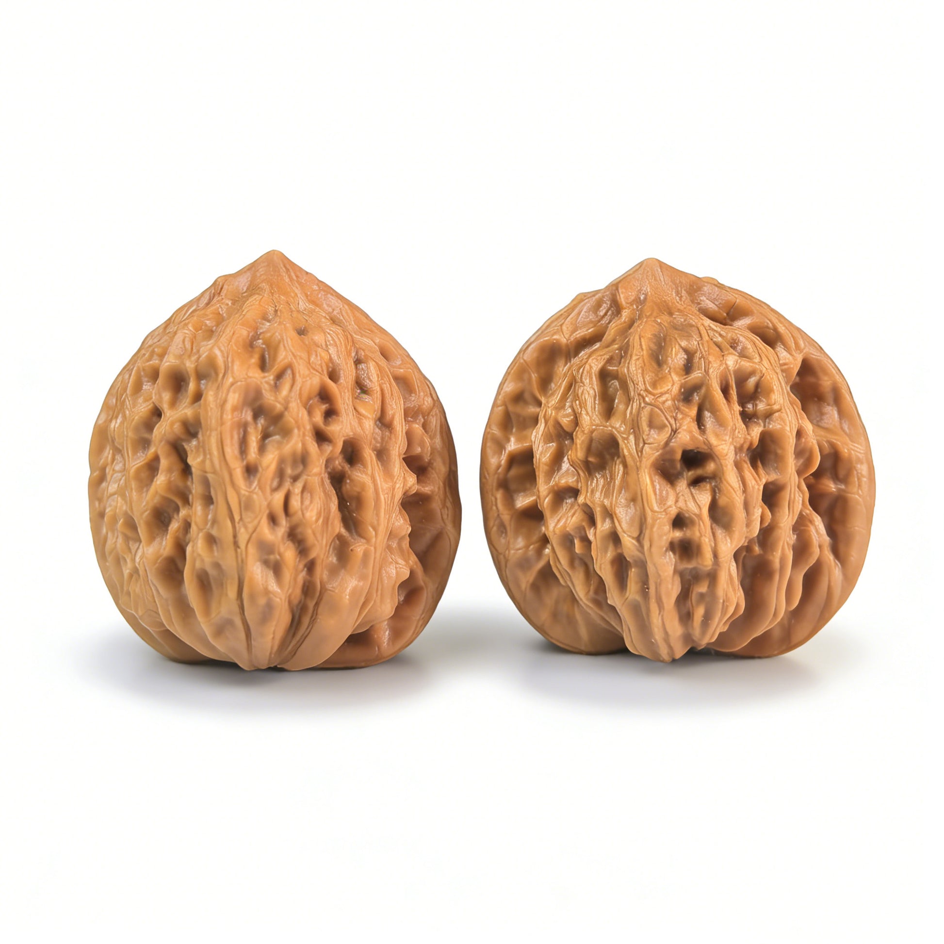 Hand exerciser pair featuring walnut material and compact size, ideal for grip strengthening by ThePatinaProject.