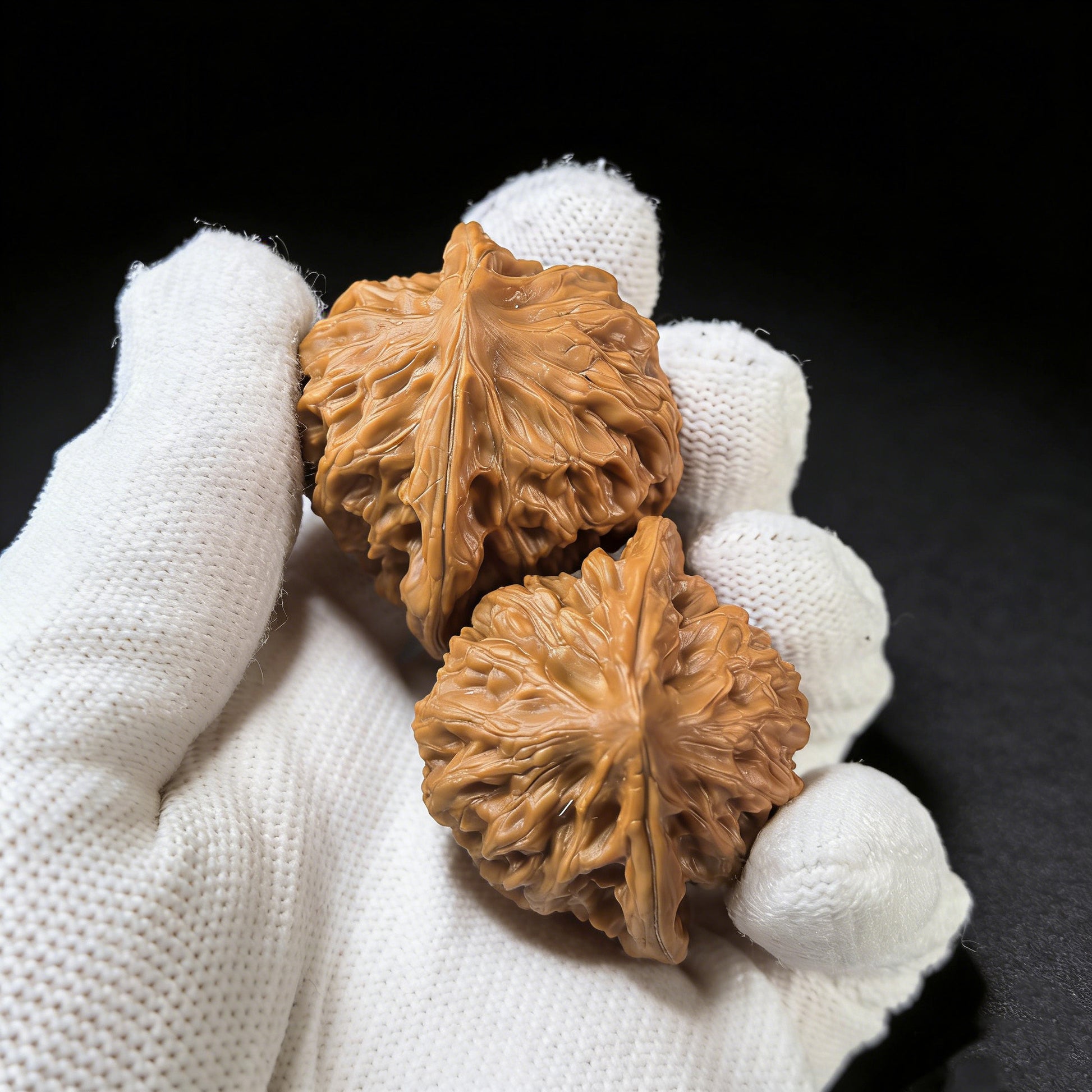 Walnut hand exerciser pair from ThePatinaProject titled Gentleman’s Hat GZM-02, 37mm x 32mm, featuring polished walnut wood.