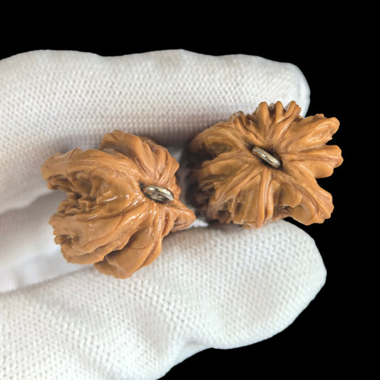 Walnut hand exercisers from ThePatinaProject featuring a gold bar double pendant set with elongated design, 25mm by 23mm.